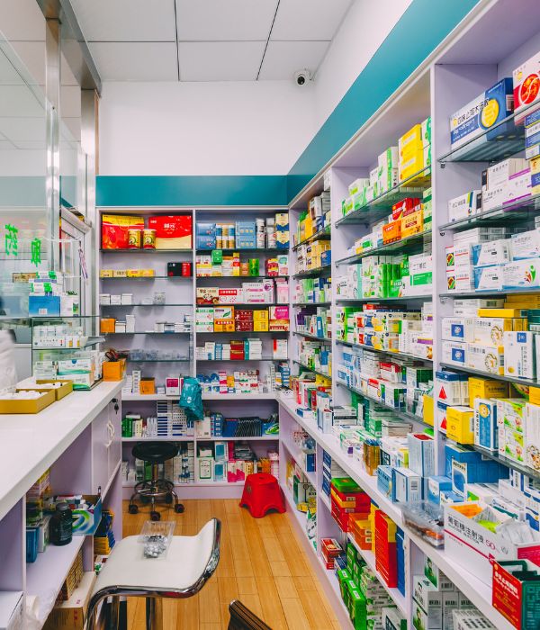 Shelves of medicine and a chair